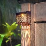 Solar-powered hollow wall lamp, garden decorative small wall lamp, bronze wall lamp, outdoor landscape lighting.